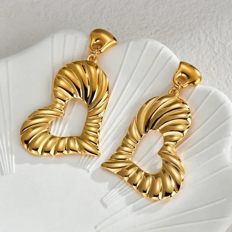 Irregular Hollow-out Titanium Steel Stud Earrings - Viexta