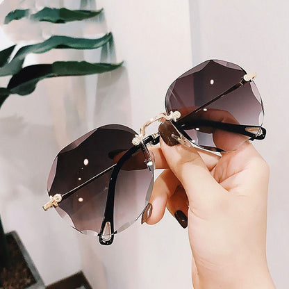 Polygonal Rimless Trimmed Sunglasses