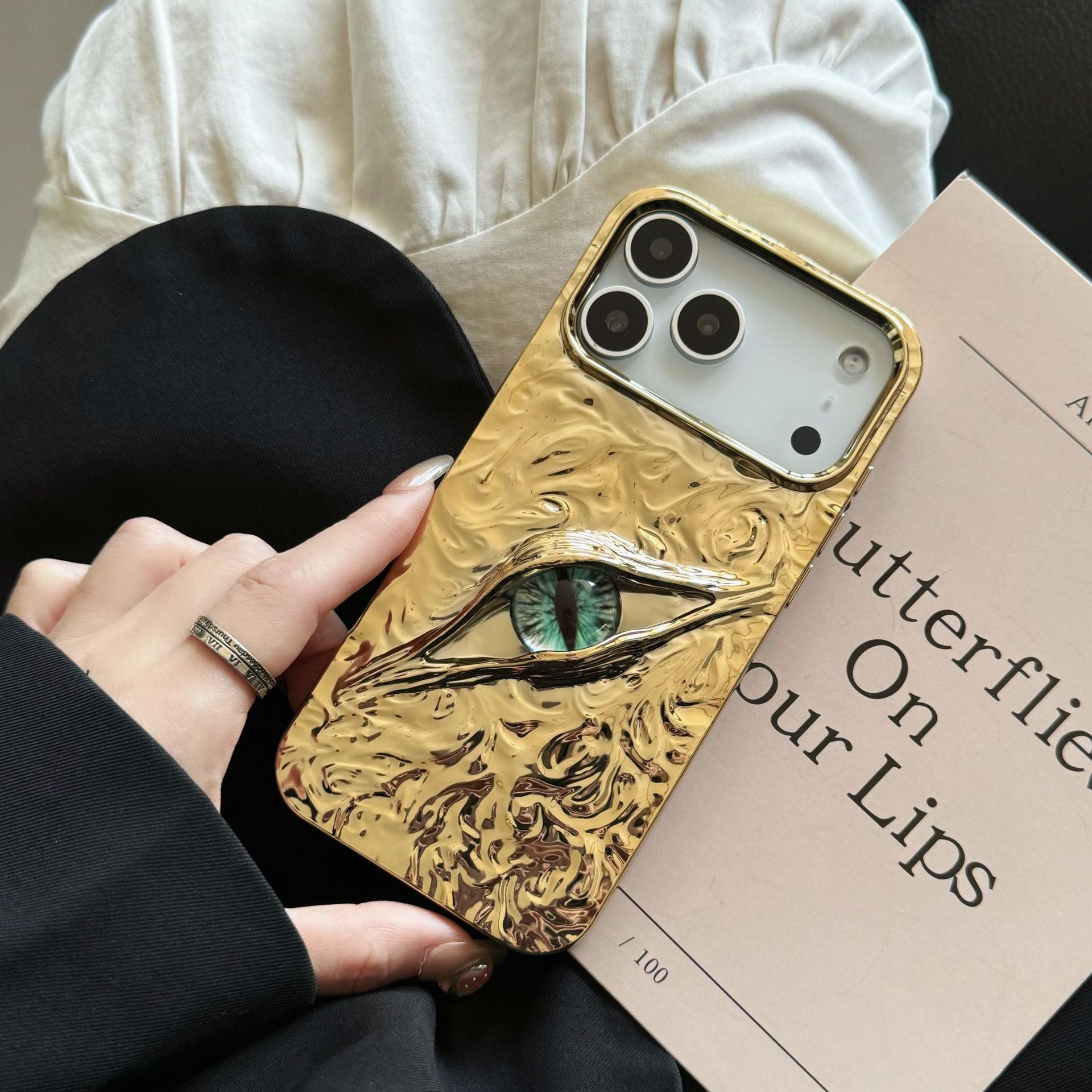 High-grade Electroplated Tin Paper Pattern Stereo Eyes iPhone Case