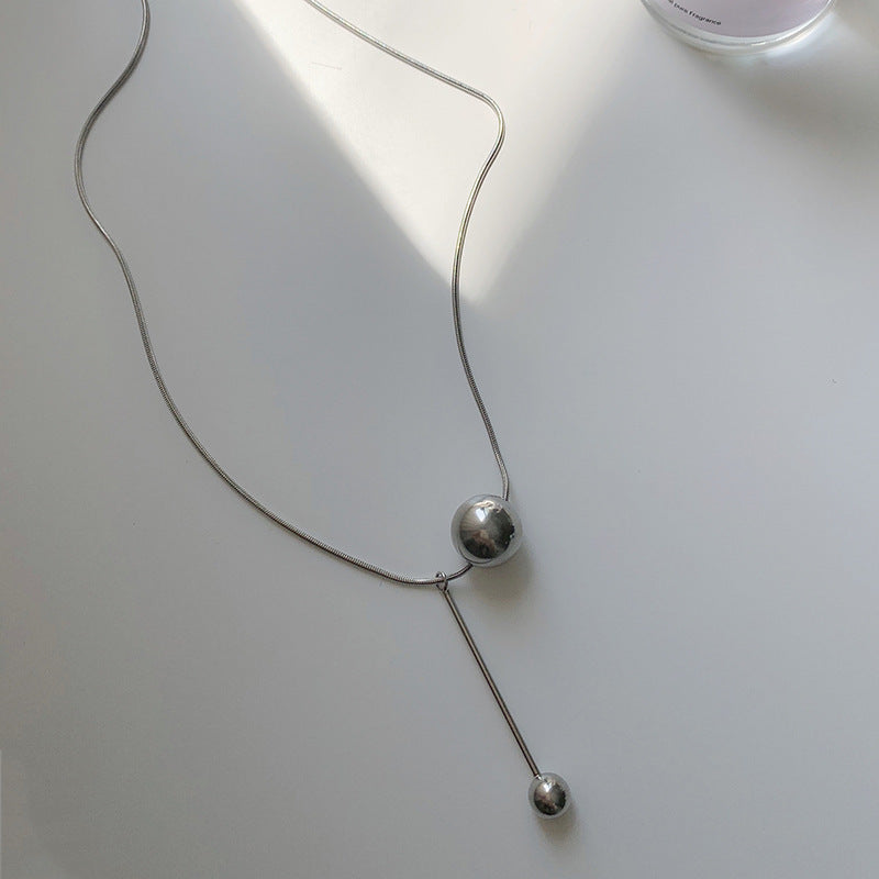 gold-ball-titanium-steel-necklace