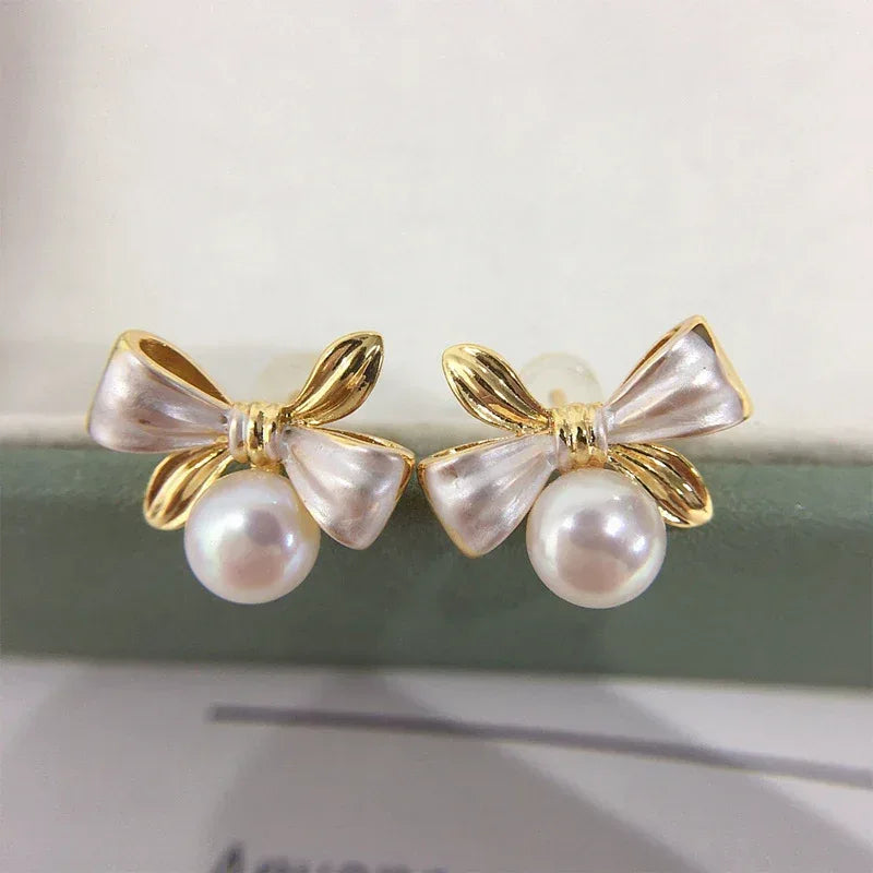 Exquisite Two-tone Bow Pearl Stud Earrings - Viexta