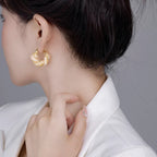 Fashion Hollow Twisted Ear Clip - Viexta