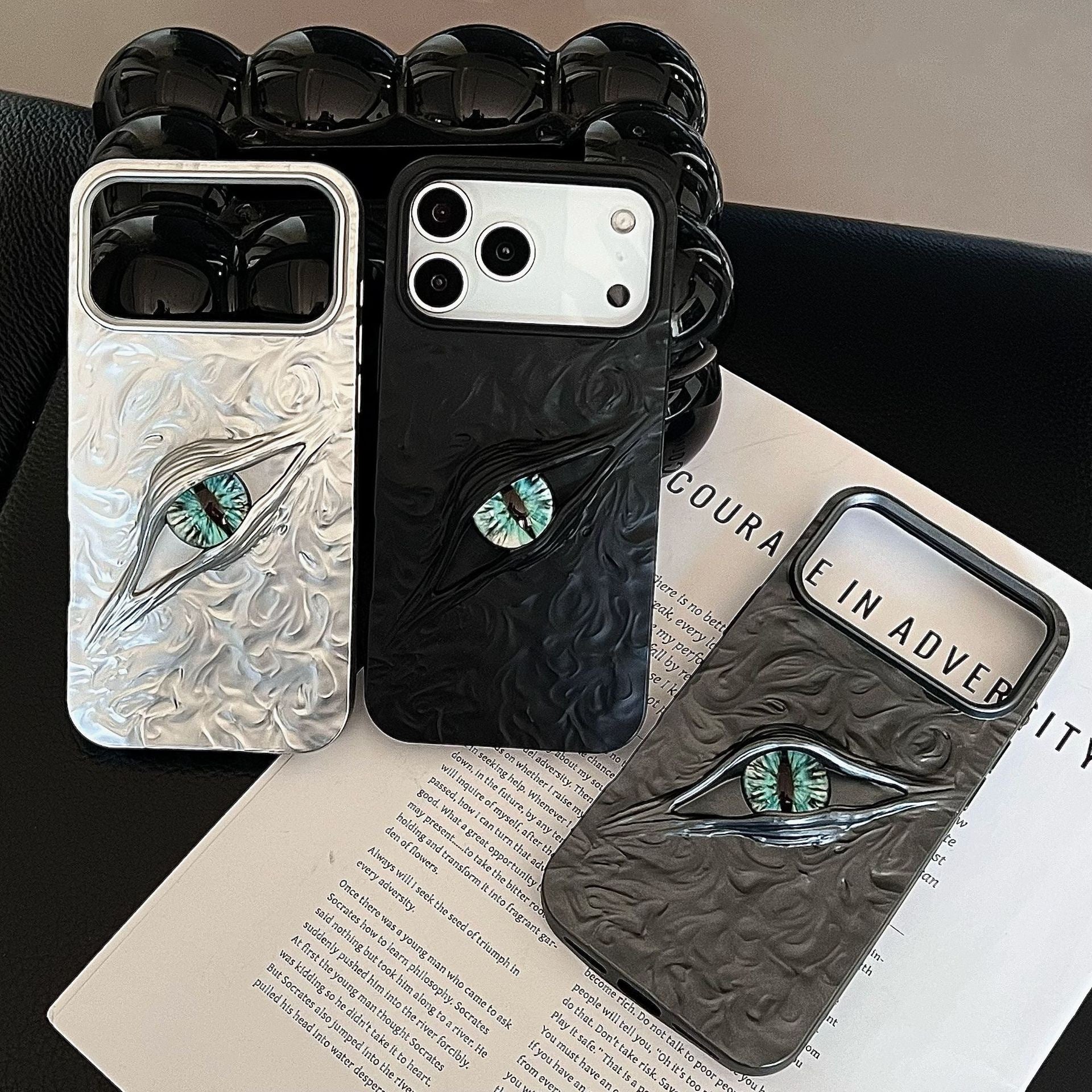 High-grade Electroplated Tin Paper Pattern Stereo Eyes iPhone Case