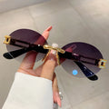 Frameless oval anti purple line sunglasses and sunglasses
