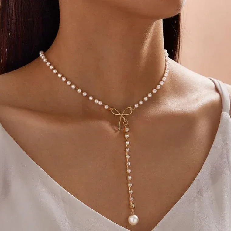 graceful-bow-long-pearl-tassel-pendant-necklace - Viexta