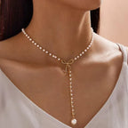 graceful-bow-long-pearl-tassel-pendant-necklace - Viexta