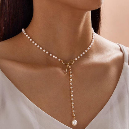 Graceful Bow Long Pearl Tassel Pendant Necklace