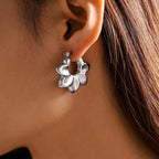 Fashionable Pleated Wave Chrysanthemum Hollow Earrings - Viexta