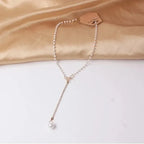 graceful-bow-long-pearl-tassel-pendant-necklace - Viexta