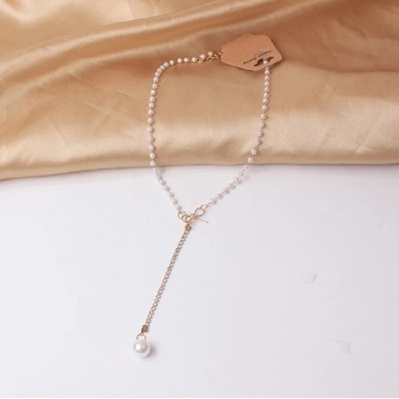 Graceful Bow Long Pearl Tassel Pendant Necklace