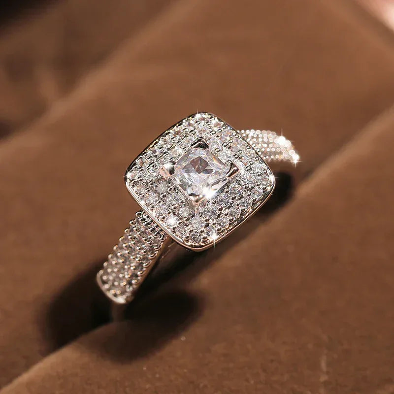 Classic Four-claw Round Zircon Engagement Ring - Viexta