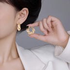 Fashion Hollow Twisted Ear Clip - Viexta
