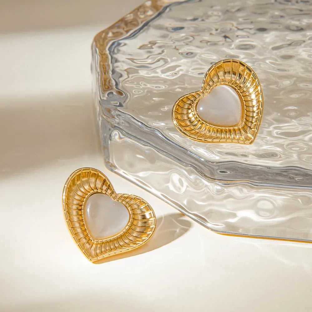 White cat eye stone earrings
