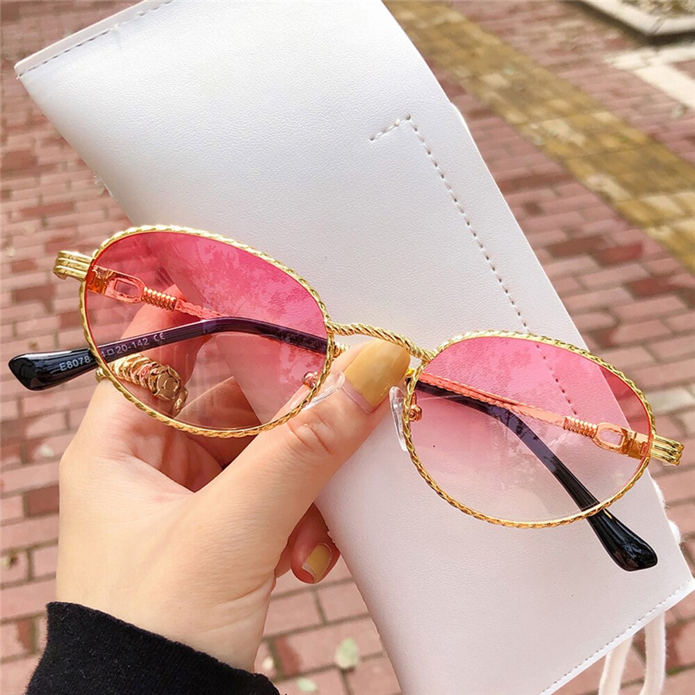 Gold metal oval sunglasses