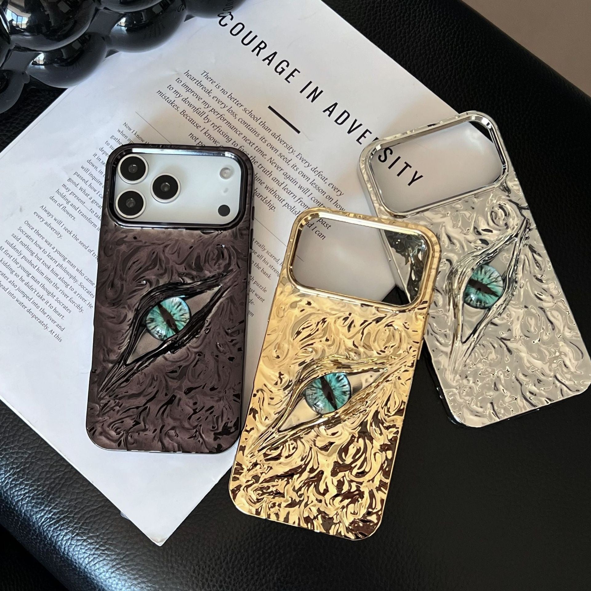 High-grade Electroplated Tin Paper Pattern Stereo Eyes iPhone Case