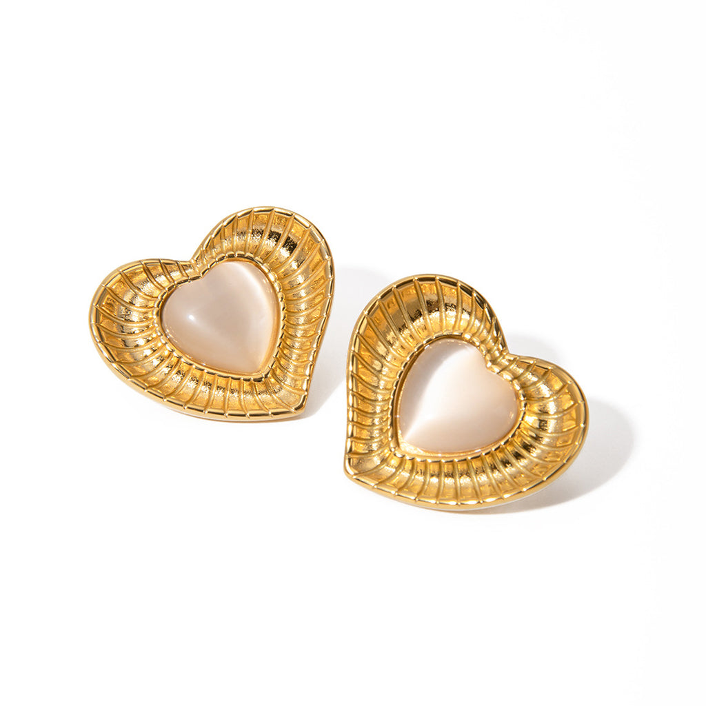 White cat eye stone earrings