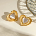 White cat eye stone earrings