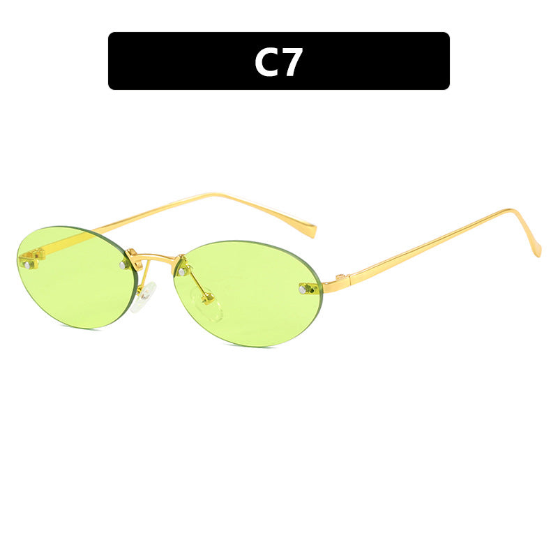 Elliptical frameless sunglasses with rivets, new fashion sunglasses, trendy street photography sunglasses for women