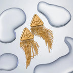 Triangular relief devil's eye design with tassel titanium steel earrings