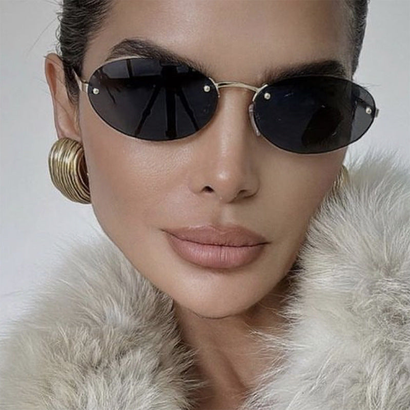 Elliptical frameless sunglasses with rivets, new fashion sunglasses, trendy street photography sunglasses for women