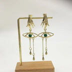 Retro Exaggerated Finger Turquoise Eyes Tassel Earrings - Viexta