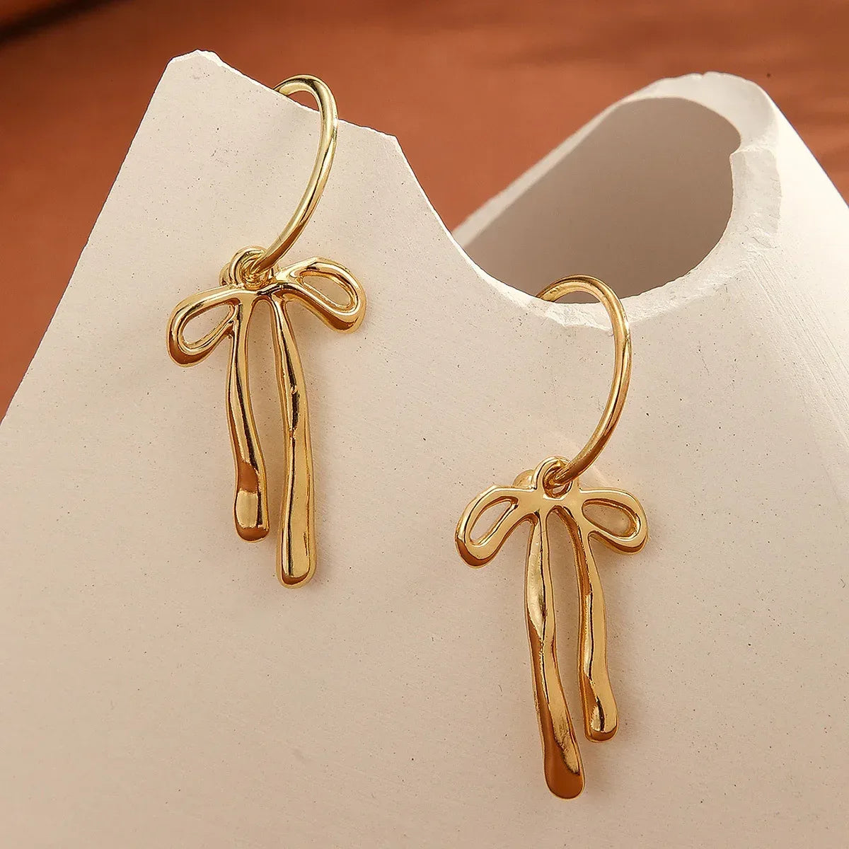 Metal Fashion Minimalist Bowknot Stud Earrings - Viexta