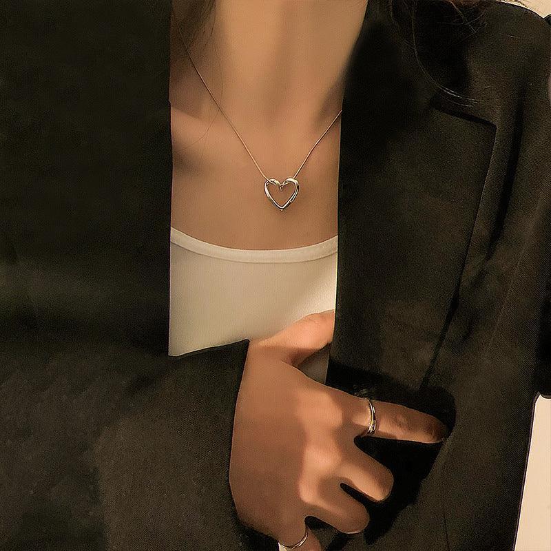 Titanium Steel Niche Hollow Heart Necklace - Viexta