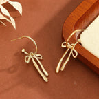 Metal Fashion Minimalist Bowknot Stud Earrings - Viexta