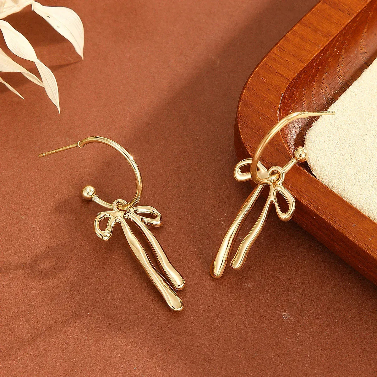 Metal Fashion Minimalist Bowknot Stud Earrings - Viexta
