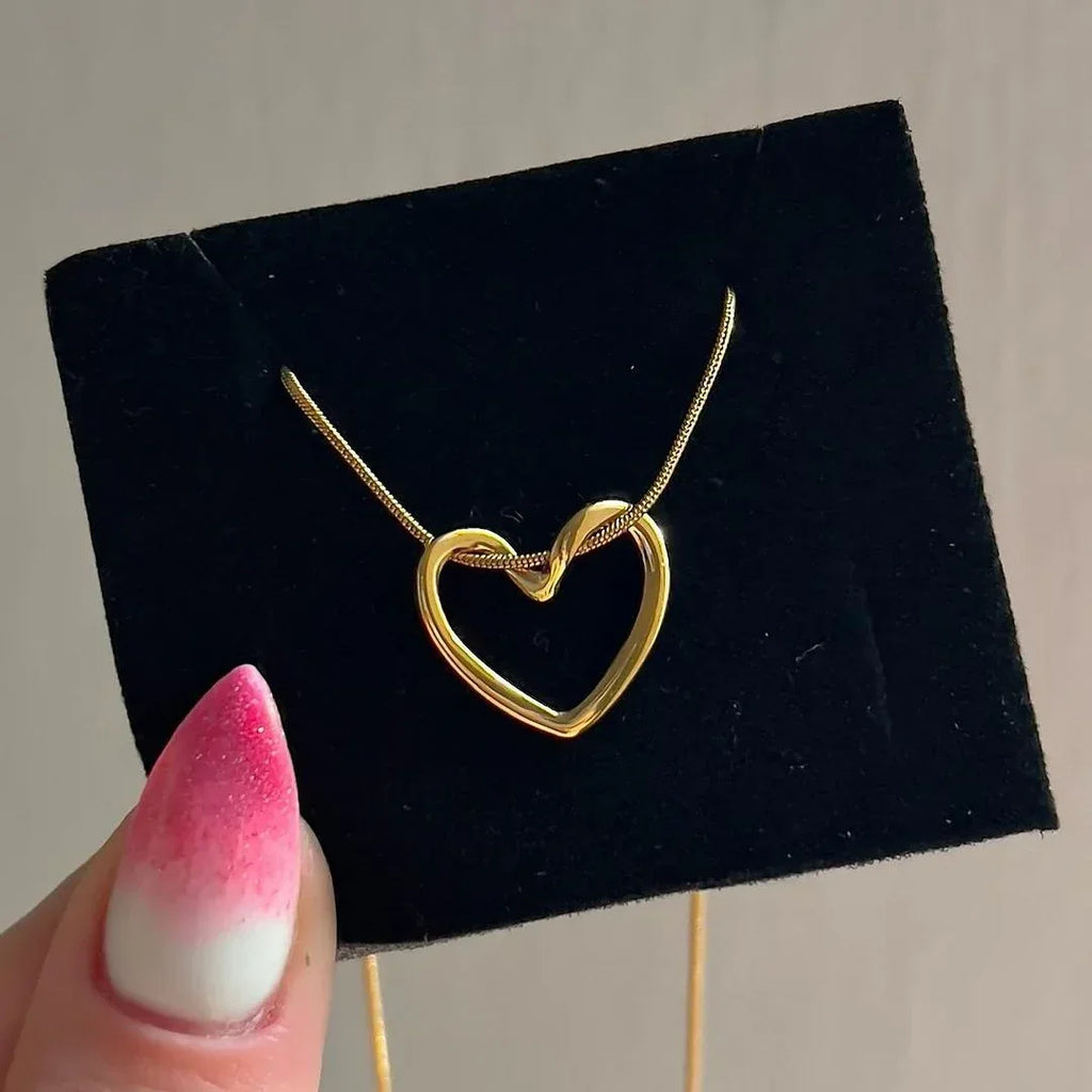 Titanium Steel Niche Hollow Heart Necklace - Viexta