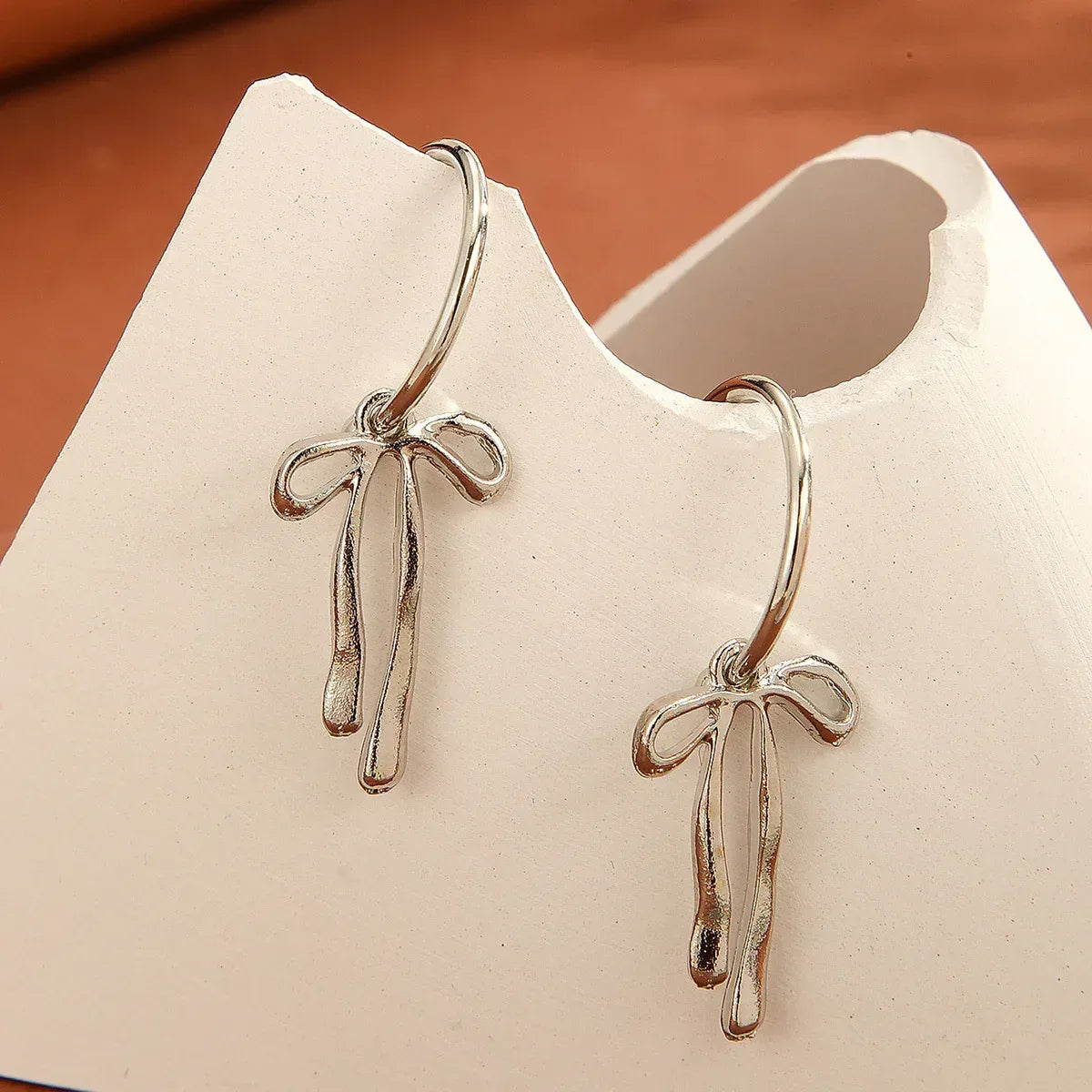 Metal Fashion Minimalist Bowknot Stud Earrings - Viexta