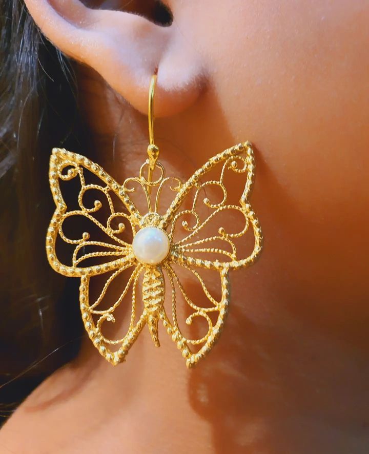 Butterfly brass earring