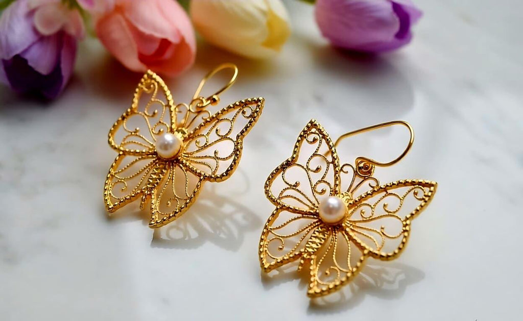 Butterfly brass earring