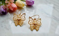 Butterfly brass earring
