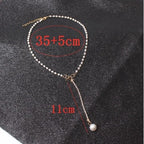 graceful-bow-long-pearl-tassel-pendant-necklace - Viexta