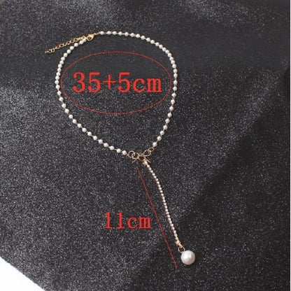 Graceful Bow Long Pearl Tassel Pendant Necklace