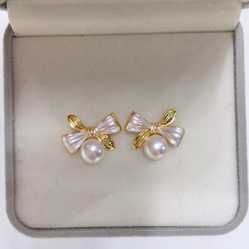 Exquisite Two-tone Bow Pearl Stud Earrings - Viexta