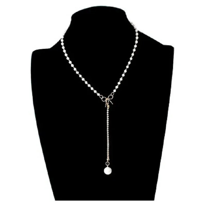 graceful-bow-long-pearl-tassel-pendant-necklace - Viexta