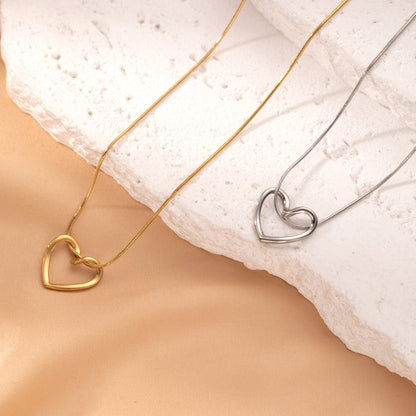 Stainless Steel Twist Hollow Heart Pendant