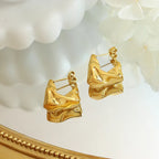 Titanium Steel Irregular Embossed Earrings - Viexta