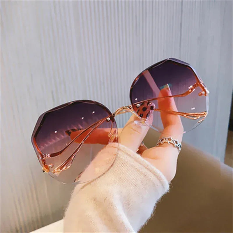 womens-temperament-anti-uv-rimless-glasses - Viexta